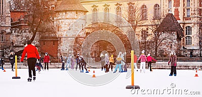 04.01.2022.Budapest.Family winter sport. Soft,Selective focus.Outdoor.Winter sport.Children and adults go ice skating on a winter Editorial Stock Photo