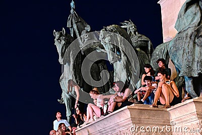 Budapest Heros Square. people high up on the bronze statues stone base. classical music concert Editorial Stock Photo