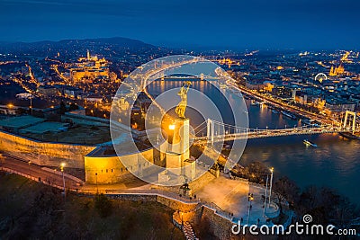 Budapest, Hungary - Aerial panoramic view of Budapest at blue hour. This view includes illuminated Statue of Liberty Stock Photo