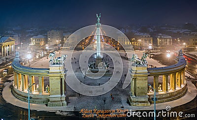 Budapest, Hungary - Aerial view of angel sculpture at Heroes` Square Hosok tere with Christmas decorated Andrassy street Stock Photo