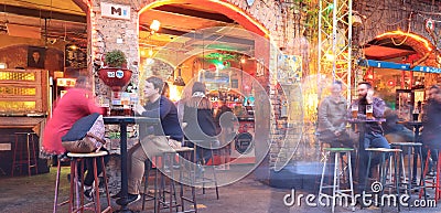 BUDAPEST, HUNGARY - april 2019: Interior view of the famous Szimpla Garden ruin pub with people enjoying night life Editorial Stock Photo