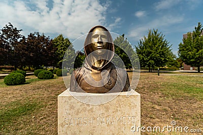 Portrait of the statue of Satoshi Nakamoto mysterious founder of Bitcoin Editorial Stock Photo