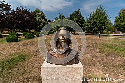 Portrait of the statue of Satoshi Nakamoto mysterious founder of Bitcoin Editorial Stock Photo