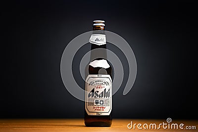 BUDAPEST, HUNGARY - CIRCA 2021: Japanese Asahi beer bootle on the table, imported fine beer Editorial Stock Photo