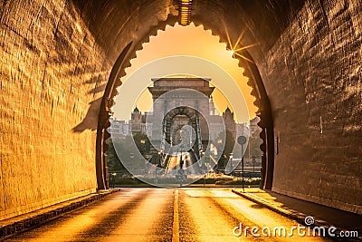 Budapest, Hungary - Entrance of the Buda Castle Tunnel at sunrise with empty Szechenyi Chain Bridge Stock Photo