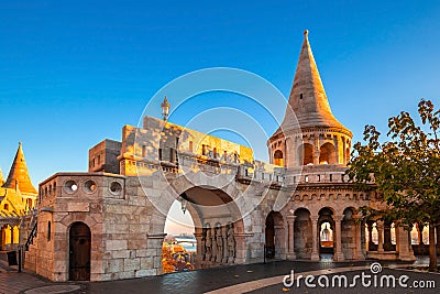 Budapest, Hungary - Entrance and tower of the famous Fisherman`s Bastion on a golden autumn sunrise Stock Photo