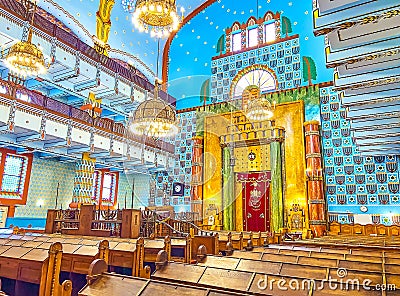The prayer hall of Kazinczy Street Synagogue with lines of wooden benches and the Eastern Wall, on February 23 in Budapest, Editorial Stock Photo