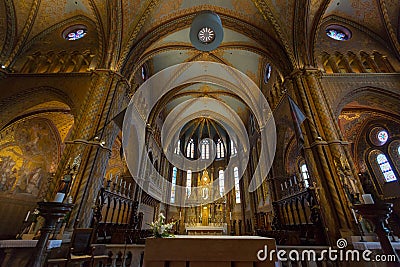 Chancel and altar of Matthias Church, Church of Our Lady of Buda, in Budapest, Hungary Editorial Stock Photo