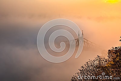 Budapest, Hungary - Liberty Bridge Szabadsag Hid surrounded by heavy fog Stock Photo