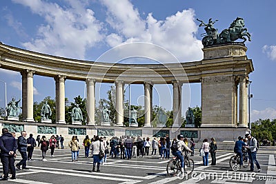 Tourists visit Millennium Monument in famous Heroes Square, located in Pest Editorial Stock Photo