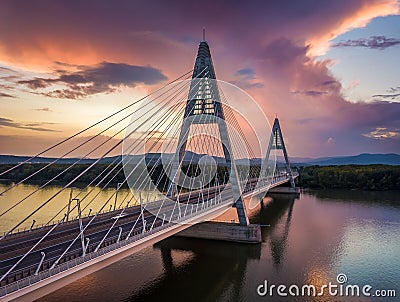 Budapest, Hungary - Megyeri Bridge over River Danube at sunset with beautiful dramatic clouds Stock Photo