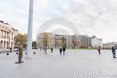 BUDAPEST, HUNGARY - OCTOBER 26, 2015: Parliament building guard in Budapest, Hungary, Tourists in background Editorial Stock Photo