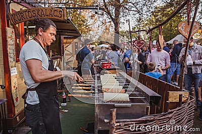 BUDAPEST, HUNGARY - OKTOBER 14, 2018: K rt skal cs Fesztiv l 2018. Bakers preparing and selling traditional hungarian pastry calle Editorial Stock Photo