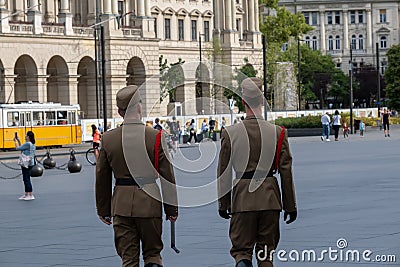 Back view of two Guards of honor near Hungarian Parliament Building Editorial Stock Photo