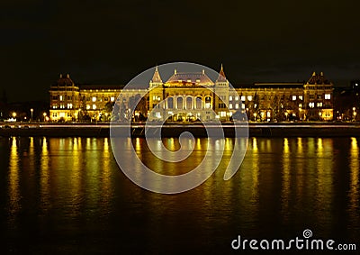Budapest night view along the Danube with attractively lit institutional building Stock Photo