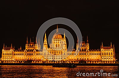 Budapest parliament night yellow illumination river bank Stock Photo