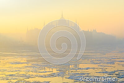 Budapest Parliament outline in yellow winter haze Stock Photo