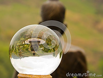 The Buddha asceticism in crystal ball Stock Photo