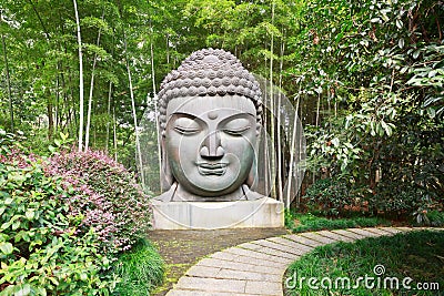 Buddha in the bamboo forest Stock Photo