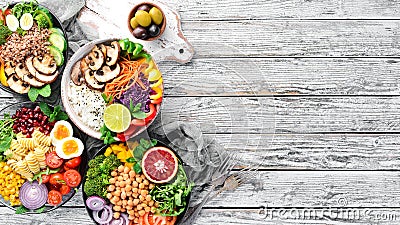 Buddha bowl on a white wooden background. Assortment of healthy food. Top view. Stock Photo