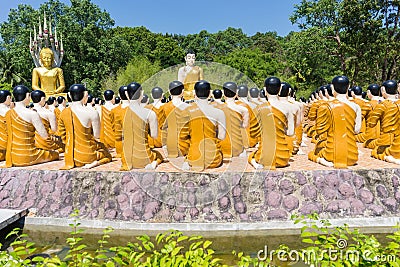 Buddha with disciple at Thai temple Stock Photo