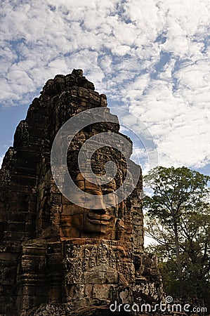 Buddha Face Carving under the blue sky Stock Photo