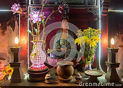 Buddha figure on chinese altar Stock Photo