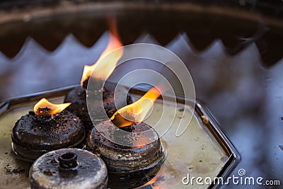 Buddha fire from oil lantern candles Stock Photo