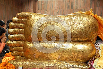 Buddha gold statue at the Mahaparinirvana Temple Kusinara or Kushinagar Uttar Pradesh India Editorial Stock Photo