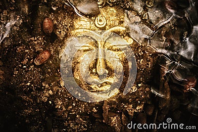 Buddha golden face underwater symbol Stock Photo