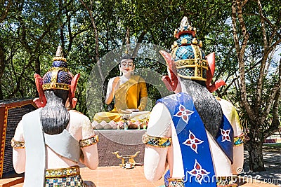 Buddha and his disciple statue in the forest Stock Photo