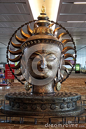 Buddha idol at the T3 Terminal, IGIA airport Editorial Stock Photo