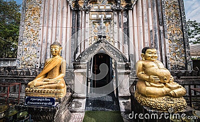 Buddha image in front of the pagoda of Wat Phra Phutthabat Bua Bok Temple that enshrines the legendary Buddha's footprint. Editorial Stock Photo