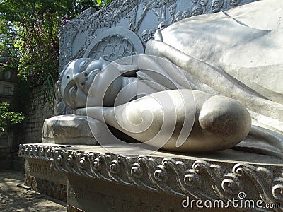 Buddha resting in the garden of the Asian temple. Stock Photo