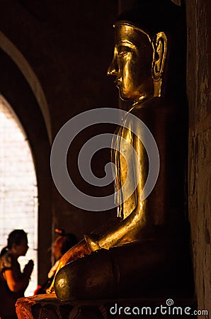 Buddha statue in a Burmese temple of Bagan Editorial Stock Photo