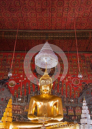 Buddha statue in consecraed consecrated convocation hall of Wat Saket Stock Photo