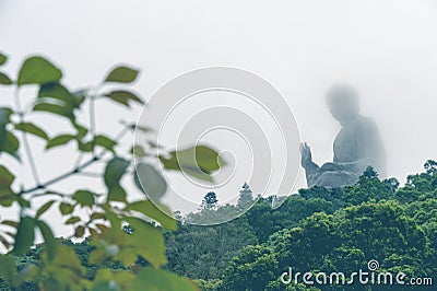 Buddha statue in the fog Stock Photo