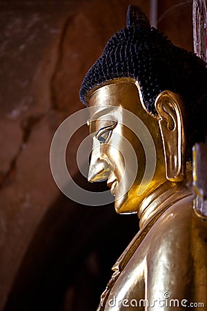 Buddha statue inside ancient pagoda in Bagan Kingdom, Myanmar. Stock Photo