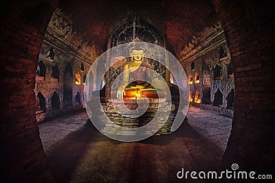 Buddha statue inside old pagoda at Bagan, Myanmar Stock Photo