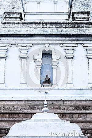 Buddha Statue in the wall of stupa in Anaradhapura Stock Photo