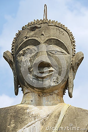 Buddha statue in Wat Piyawat temple in Muang Khoun, Laos. Stock Photo