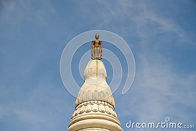 Buddha Statue on White Pagoda , Blue Sky and Cloud Stock Photo