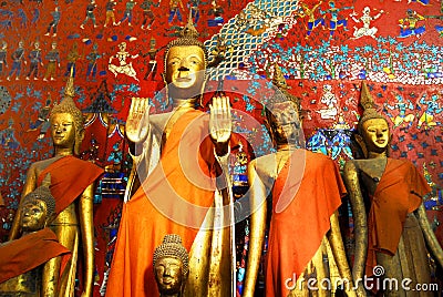 Buddha statues in Wat Xieng Thong Stock Photo