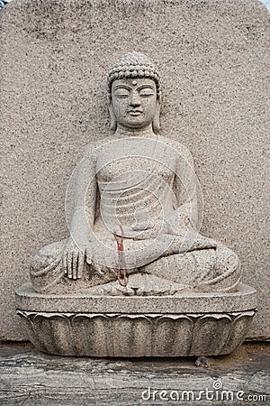 Buddha stone statue Stock Photo