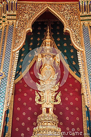 Buddhanarumitr Buddha image statue, replicating King Rama II, enshrined in Thai styled golden chariot movable throne in front of Stock Photo