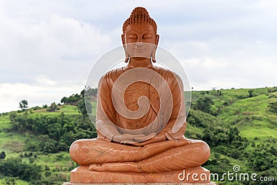 Buddhas with mountain background Stock Photo