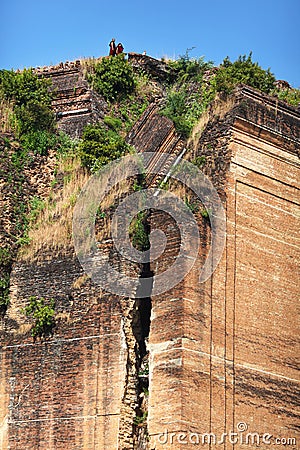 Buddhis monks atop Mingun temple, Myanmar Editorial Stock Photo