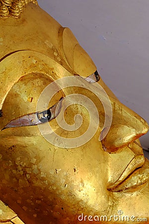 Buddhism gold face Stock Photo