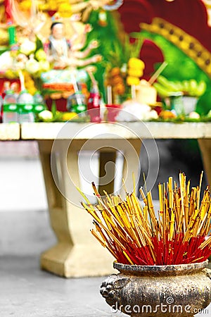 Buddhism, Thailand Religion. Incense Sticks In Urn In Temple. Pr Stock Photo