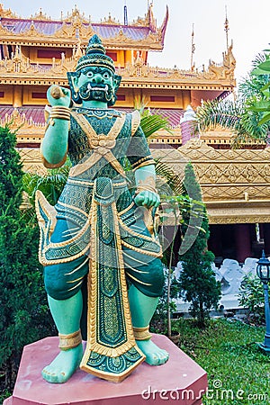 Buddhist demon at Kyauktawgyi temple in Mandalay, Myanm Stock Photo